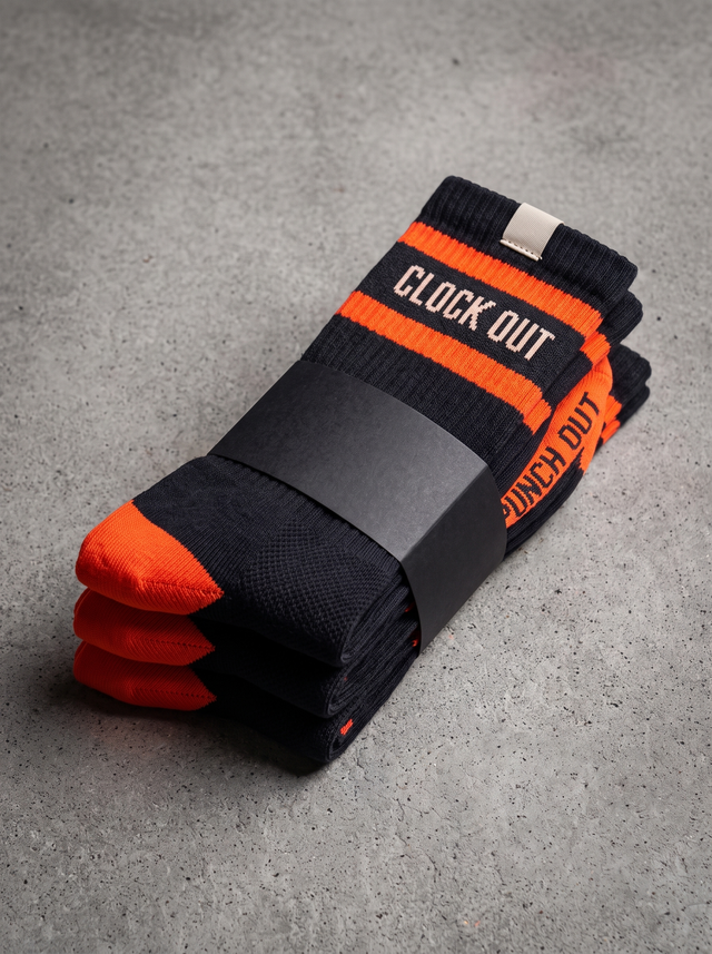 Three pairs of black Shift Socks folded in a stack