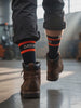 Worker walking across warehouse concrete in Shift Socks